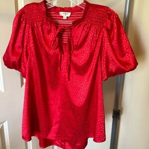 Small red boutique blouse with bell sleeves